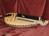 Custom Hurdy Gurdy based on a luteback Colson, decorated with a cat and mouse theme